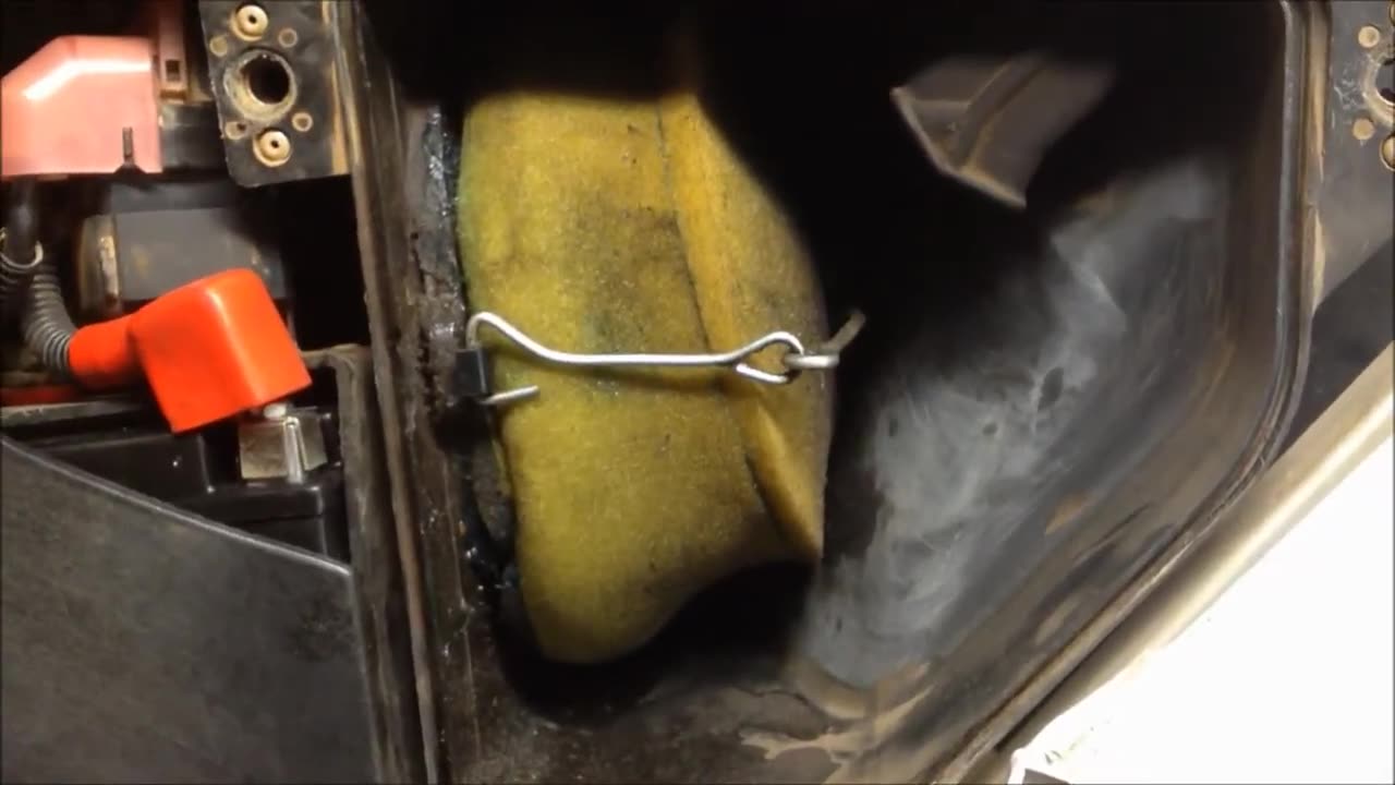 How to Access the Air Filter in a 2006 Suzuki DRZ 250
