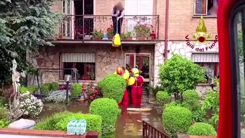 Italian firefighters evacuate stranded residents