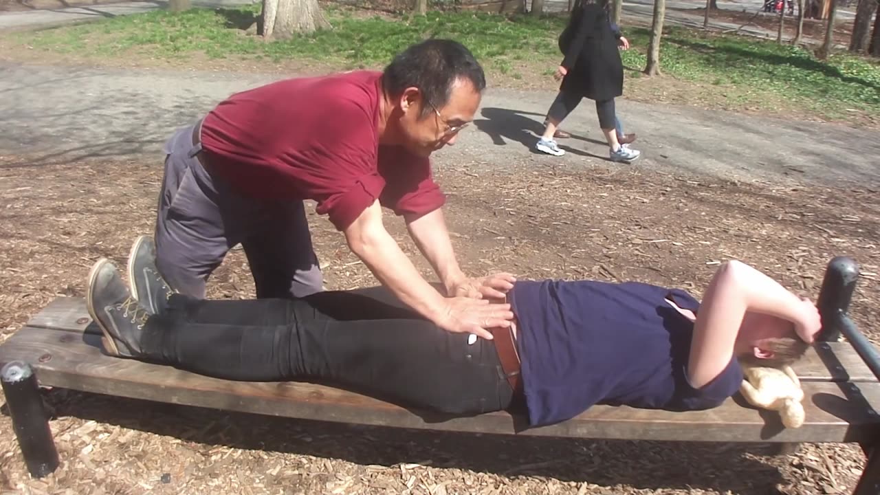 Luodong Gives White Woman Full Body Massage On Park Bench