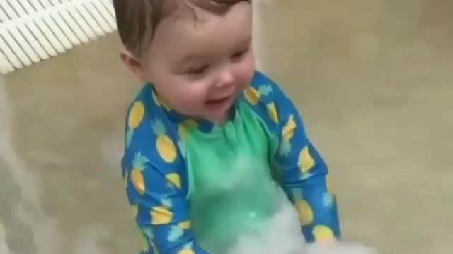 Babies & Kids—The joy of the child while playing with water cute