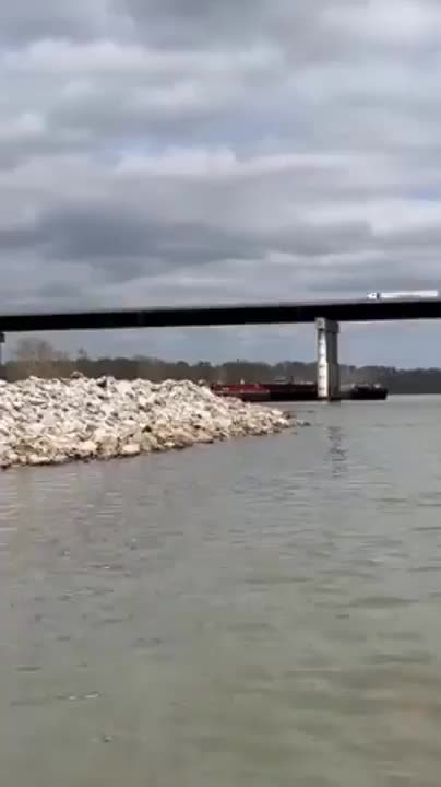 The US-59 bridge in Sallisaw, Oklahoma is shut down after being struck by a barge