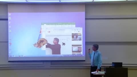 Math teacher tries to fix projector prank