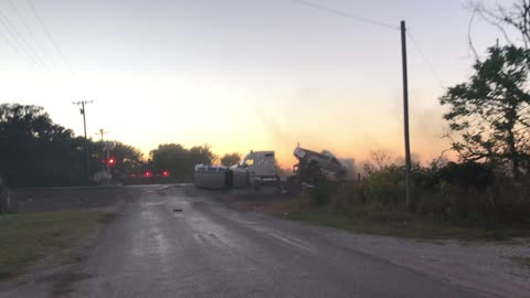 Train Plows Through Car Carrying Semi