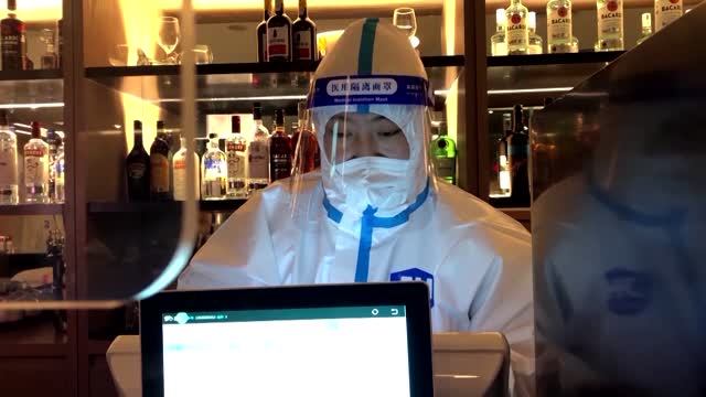 Cocktails and hazmat suits in Beijing bubble