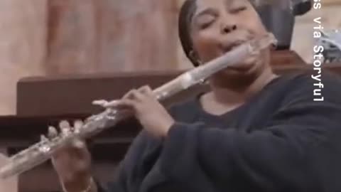 Lizzo Playing AntiqueFlutes During Library ofCongress Visit is ICONIC