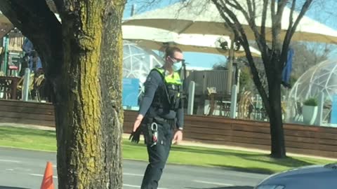 Dancing Cop Entertains Aussie Drivers During Lockdown