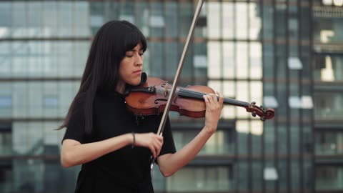 Beautiful woman playing Violin At Street [Free Stock Video Footage Clips]