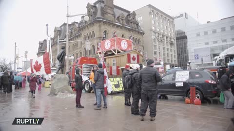 Show of force in Ottawa as police clear main protest hub Truckers defy heavy police presence Ottawa