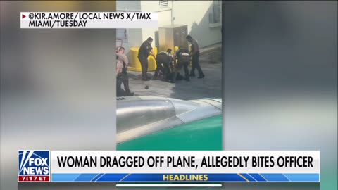 FRONTIER AIRLINES |MIAMI FL| WOMAN DRAGGED OFF PLANE, ALLEGEDLY BITES OFFICER