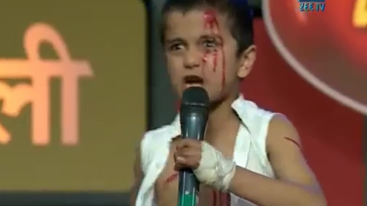 sweet little boy making Indian heroes mimicry