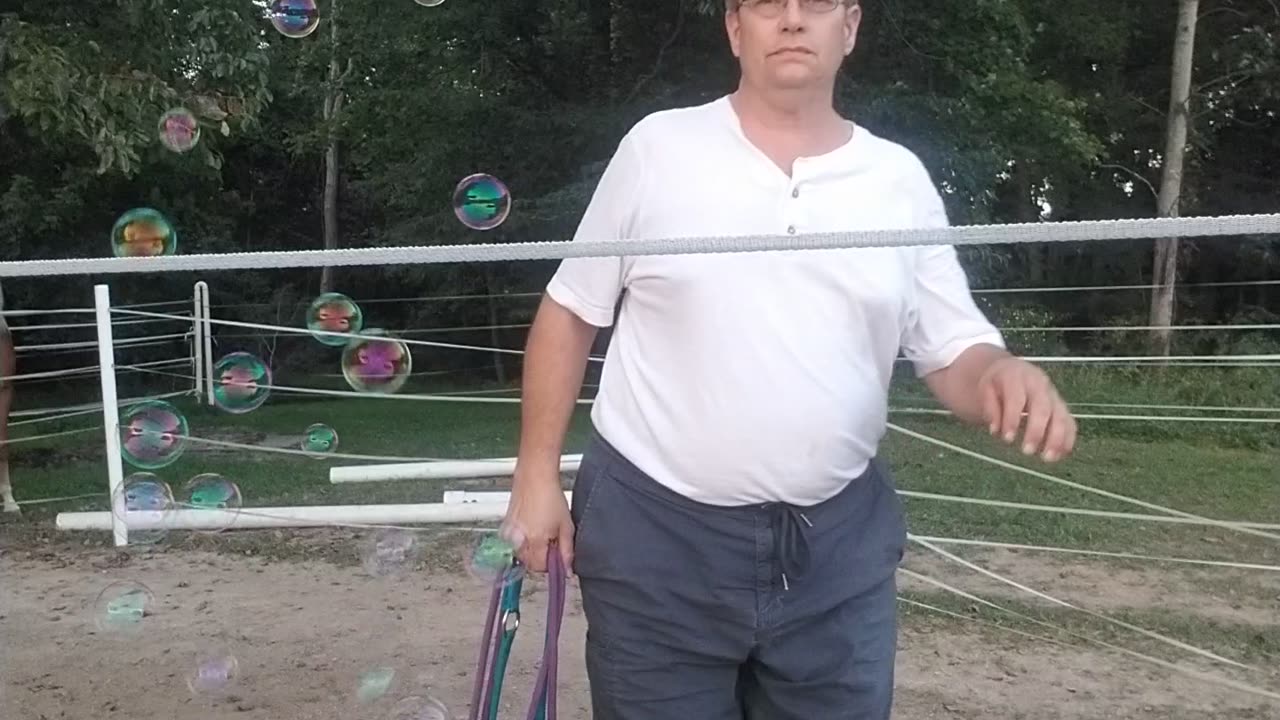 Hand walking through the bubbles