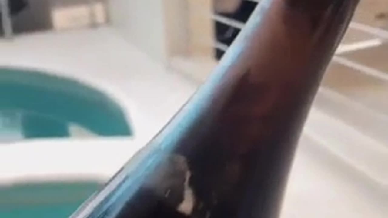 This woman popping a cork with a glass trick.