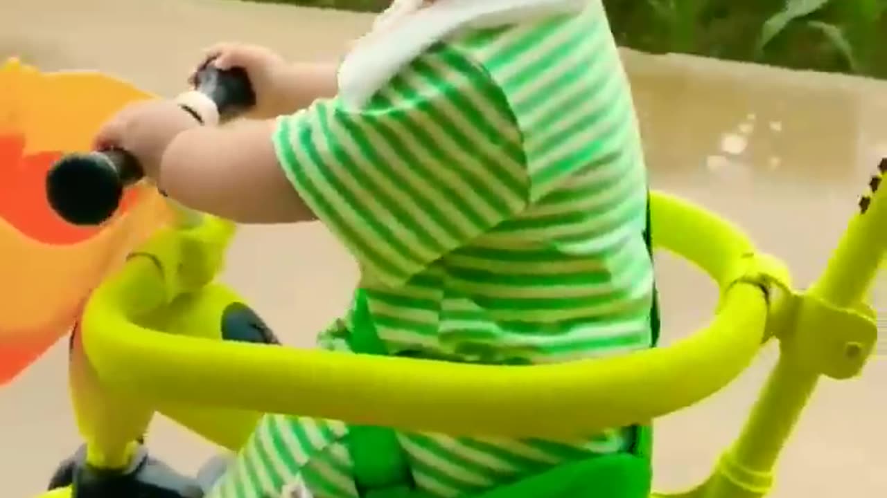 Cute baby cycling