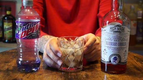 High Mark Distilling Blueberry Cobbler Moonshine & Mtn Dew Purple Thunder