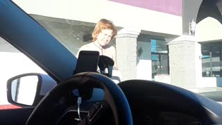 Woman Crosses Street Wearing Towel