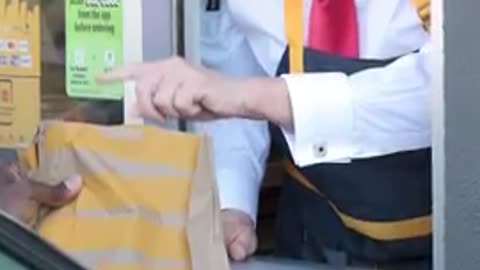 Trump works the fryer at McDonald s and takes jab at VP Harris