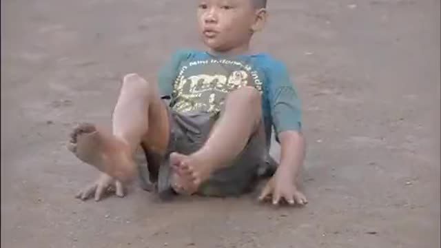 Children Play Football with rain