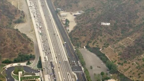 TRUMP Sign Resembling HOLLYWOOD Sign Placed On 405 Freeway In California