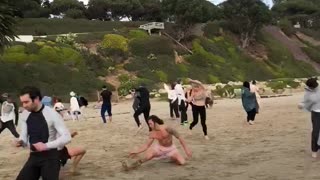 Dancing on East Beach at sunset
