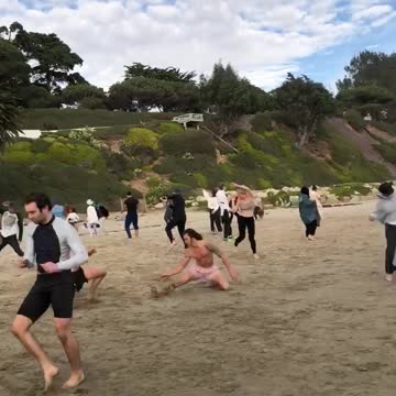 Dancing on East Beach at sunset