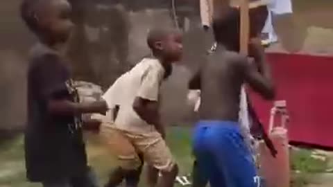 Uganda .🇺🇬 kids are re-enacting the assassination attempt on Trump . !