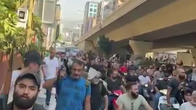 Hezbollah and their supporters marched with guns protesting over Beirut port blast judge