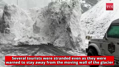 10-ft high glacier wall breaks off, slides onto highway