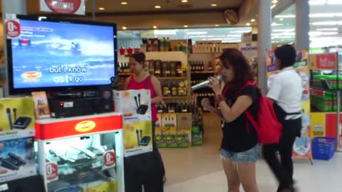 A Random Girl Steps Up To A Karaoke Machine and Floors Everyone