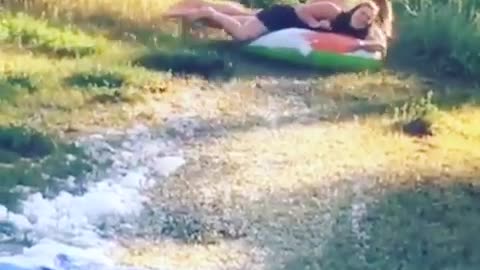 Collab copyright protection - girls on floatie slip n slide flip