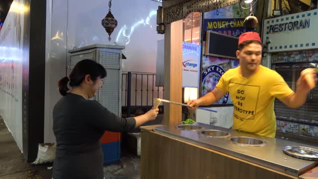 Comical Ice Cream Vendor in Kuala Lumpur