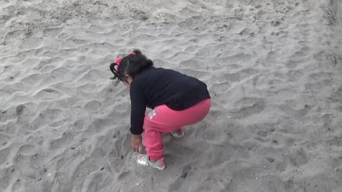 Baby Girl At The Beach