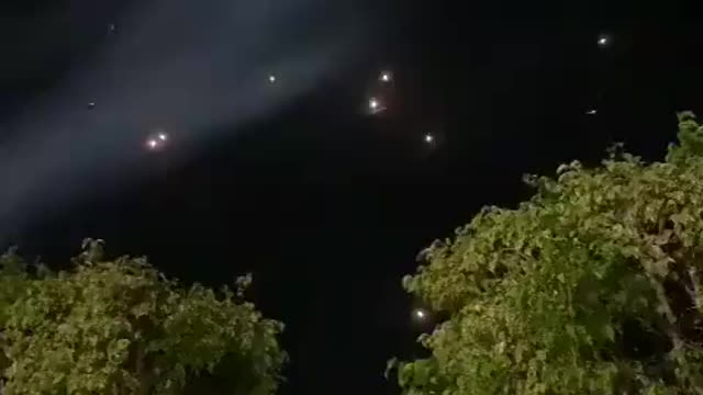 Iron Dome lights up the sky in Israel as a massive rocket barrage is being intercepted