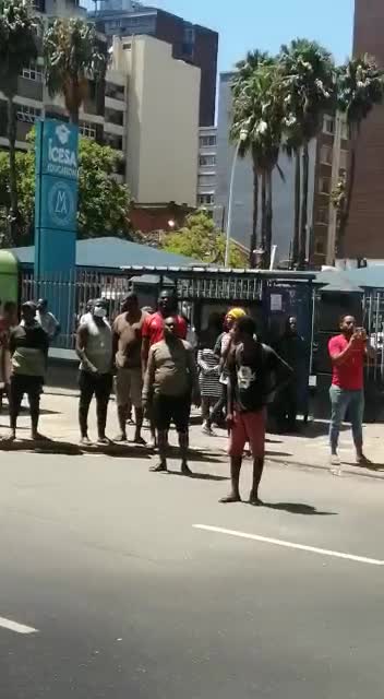 People trying to escape the fire at China Emporium in the Durban CBD.