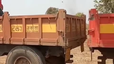 Truck Falls on JCB Machine