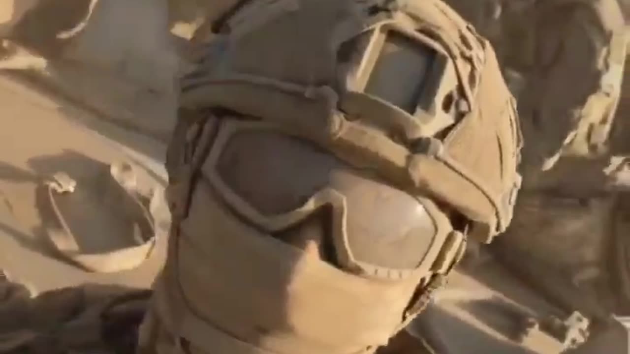 Russian soldiers driving through a dusty road somewhere in the SMO zone
