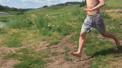 Man Dives Face-first Into Shallow Water