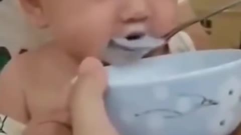 Chubby baby eating