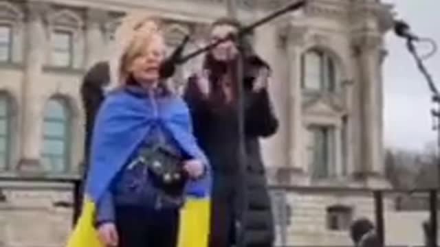 Ukrainian girl singing for the genocide of Russians (in Germany)