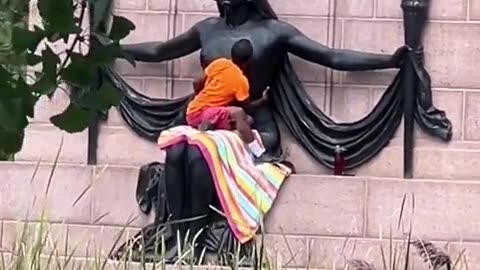 Illegal Alien Molest Statue