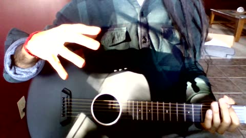 Trying out the Joytar Carbon Fiber Guitar