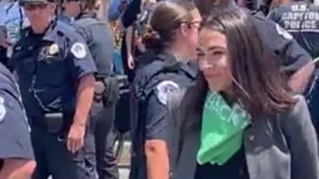 LOL: AOC PRETENDS To Be Handcuffed at Protest!!