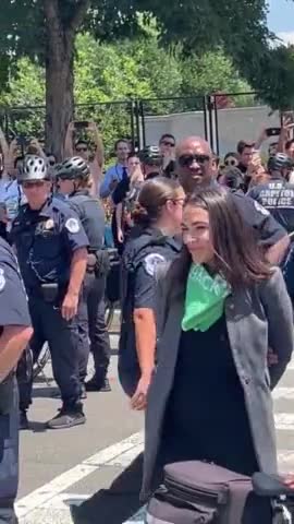 LOL: AOC PRETENDS To Be Handcuffed at Protest!!