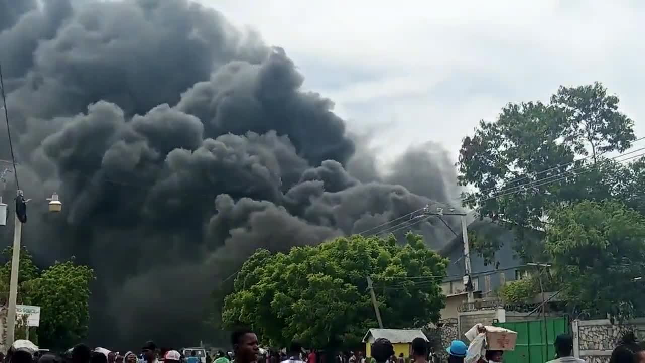 In Haiti, protesters take all the food and set Gonaives World Food Program facility on fire.