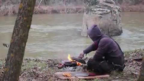 Burger & fried potatoes on the stone in the woods (beautiful nature)