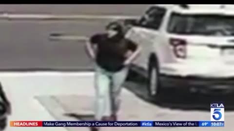 Shocking moment man gets dragged by car after being robbed