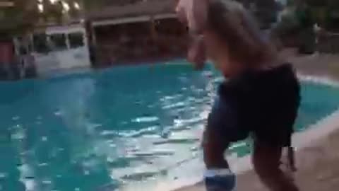 Guy fail jumps into pool foot hits edge