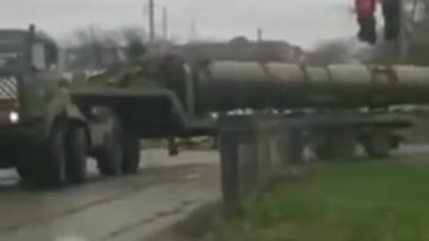 The occupiers carry missiles to shoot at Ukraine. The author of the film claims that it is Taganrog