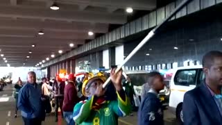 Fan await the arrival of Banyana Banyana at OR Tambo International Airport