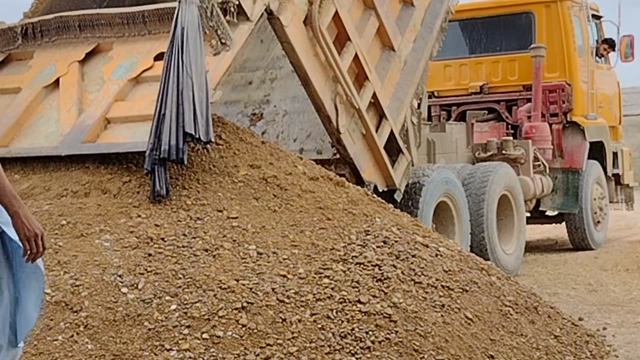 Unloading mix sand on our blocks making plant