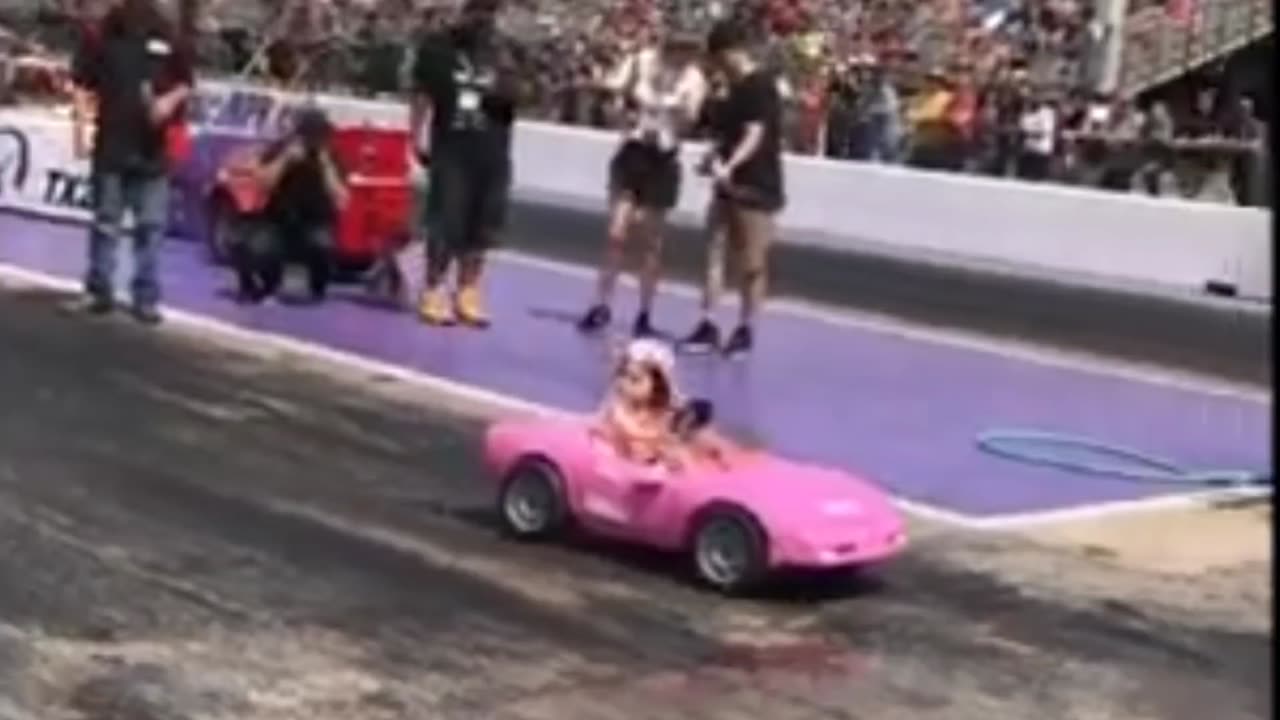 Girl doing Donuts in Toy Car